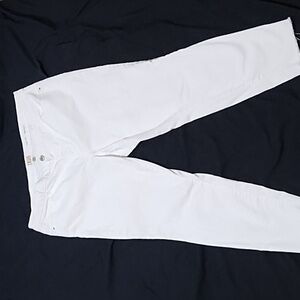 True Craft White denim jeans. Slightly distressed and with ragged leg hems.
